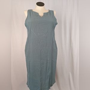 Women's sleeveless dress with two pockets. Polyester